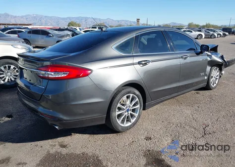 2017 Ford Fusion Energi Titanium from USA, damaged, VIN 3FA6P0SU0HR379525